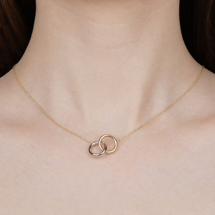 Two interlocking circles necklace on sale meaning