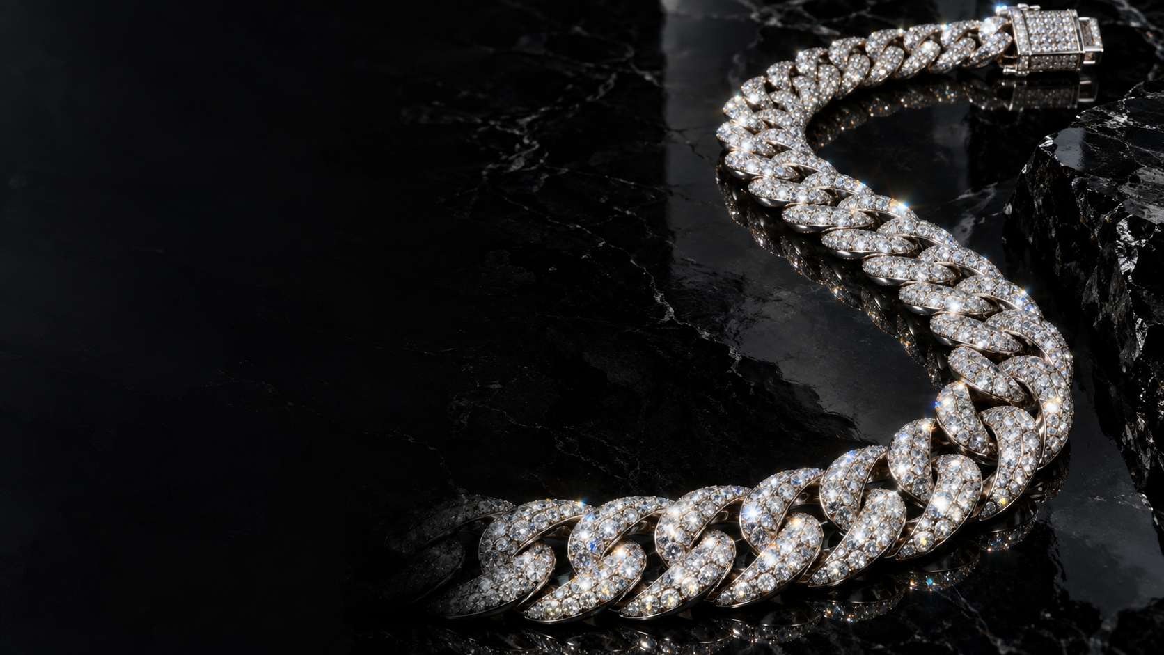 Diamond Cuban chain on black stone — campaign artwork